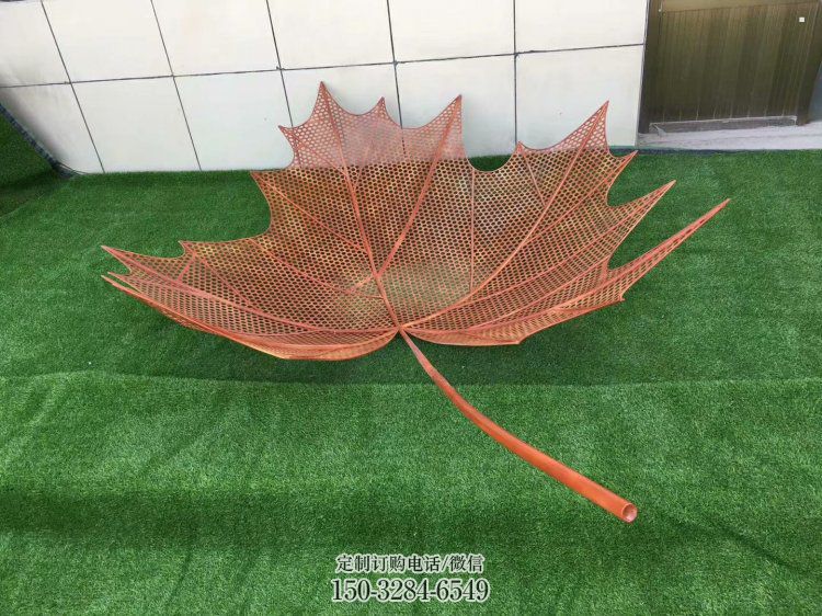 鏤空樹葉雕塑，景區(qū)雕塑，鐵藝樹葉雕塑廠家指用